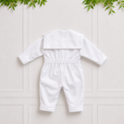 Back of white baby boy sailor suit with long sleeves, sailor collar, anchor detail & tailored trousers, perfect for christenings.