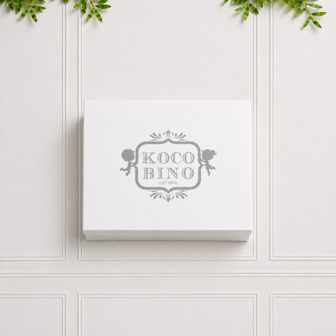 Luxury Koco Bino baby gift box in elegant white keepsake packaging, perfect for presenting a baby girl gift set or newborn gift.