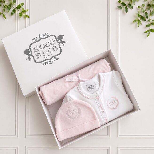Baby girl gift set beautifully packed in a luxury Koco Bino gift box with a white babygrow, pink blanket and matching hat.