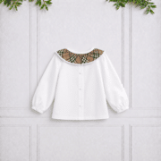 Back view of a white girls' blouse with a checked Peter Pan collar, button fastening and long sleeves, displayed against a neutral studio background.