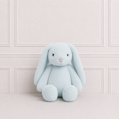 Soft blue bunny plush toy with long floppy ears, pink nose and cuddly design, displayed on a neutral background for nursery décor and play.