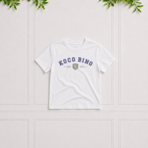 White boys' short sleeve cotton T-shirt with blue Koco Bino varsity print and crew neckline, perfect for casual everyday outfits.