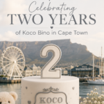 Koco Bino celebrates two years as a baby & kids store in Cape Town at the V&A Waterfront with an anniversary cake and iconic city backdrop.