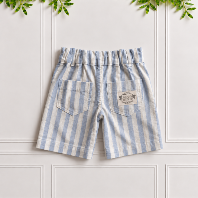 Back of boys' linen shorts in blue and white striped cotton linen with two patch pockets and Koco Bino label