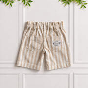 Back view of boys’ stone and white striped cotton linen chino shorts with two back pockets, a Koco Bino label and classic tailored fit.