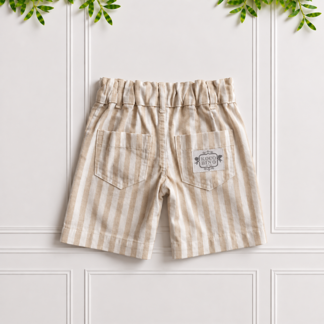 Back view of boys’ stone and white striped cotton linen chino shorts with two back pockets, a Koco Bino label and classic tailored fit.
