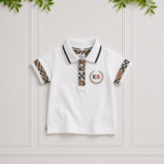 White boys designer polo shirt with checked detailing, contrasting collar and embroidered KB crest, ideal for smart and stylish everyday outfits.