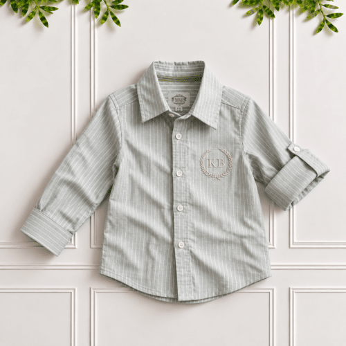 Boys sage green shirt in striped cotton linen with classic collar, long sleeves, roll-up tabs and monogram embroidery.