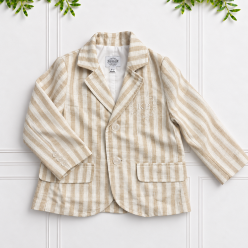 Boys stone and natural striped linen blazer with white lining, classic lapels, button fastening and embroidered KB detail by Koco Bino.