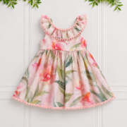 Girls’ Pink Floral Dress with pink orchid print, frilled neckline and delicate lace edging, shown from the front.