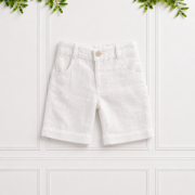 Boys white linen shorts with a classic tailored fit, front pockets, belt loops and button fastening, perfect for smart summer outfits.