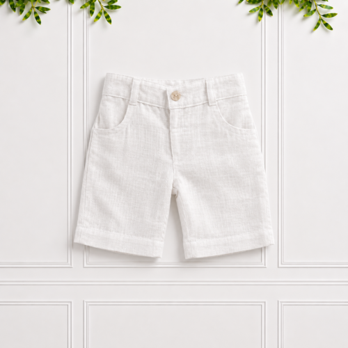 Boys white linen shorts with a classic tailored fit, front pockets, belt loops and button fastening, perfect for smart summer outfits.