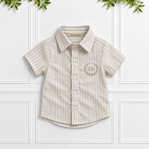 Boys’ stone and vanilla striped 100% linen shirt with short sleeves, classic collar and cream KB monogram embroidery.