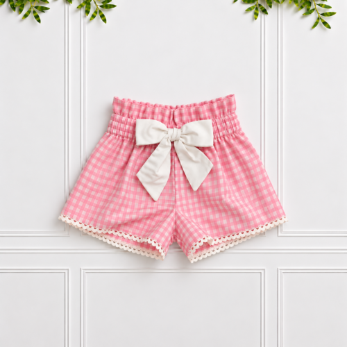 Girls’ Pink Gingham Shorts with white poplin bow and pompom edging by Koco Bino