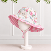 Girls floral sunhat with pink and white seersucker striped frill, matching striped binding and toggle tie, by Koco Bino for sunny summer days.