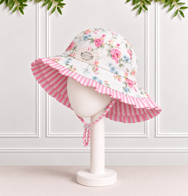 Girls floral sunhat with pink and white seersucker striped frill, matching striped binding and toggle tie, by Koco Bino for sunny summer days.